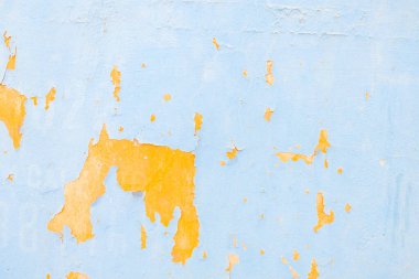 Eski dokular turkuaz mavi çatlamış duvar, eski boya dokusu çatlıyor ve yıkılıyor.