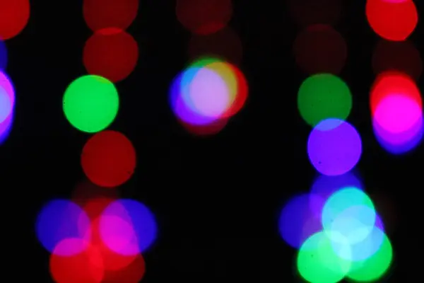 Предпосылки Контекст Bokeh Stars Flashing Colored Elements Black Background Wind — стоковое фото