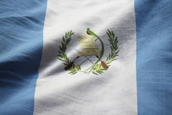皱的危地马拉国旗 危地马拉国旗在风中吹的特写 — 图库照片