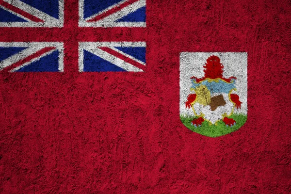 百慕大国旗在磨碎的水泥墙 — 图库照片