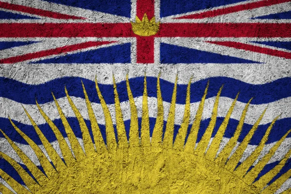 British Columbia flag on the grunge concrete wall
