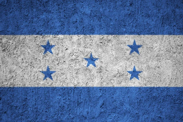 洪都拉斯国旗在格格水泥墙上 — 图库照片
