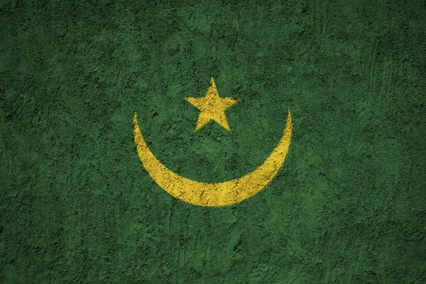 在格格水泥墙上挂上毛里塔尼亚国旗 — 图库照片