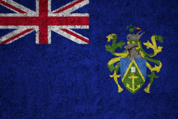 グランジのコンクリート壁にピトケアン諸島の旗 — ストック写真