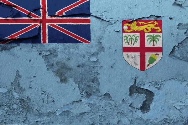 在破裂的水泥墙上画的斐济国旗 — 图库照片