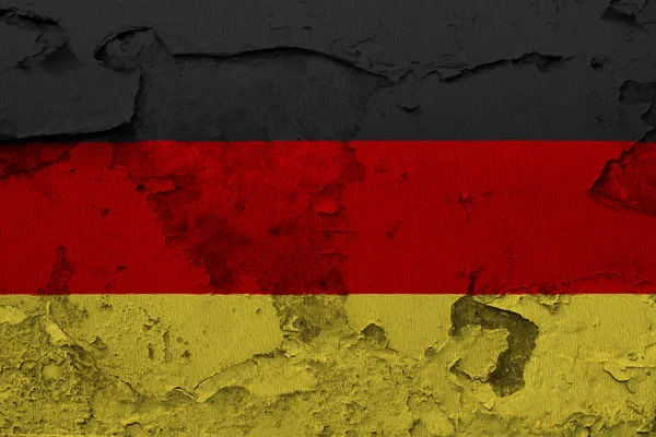 ひびの入ったコンクリートの壁に描かれたドイツの国旗 — ストック写真