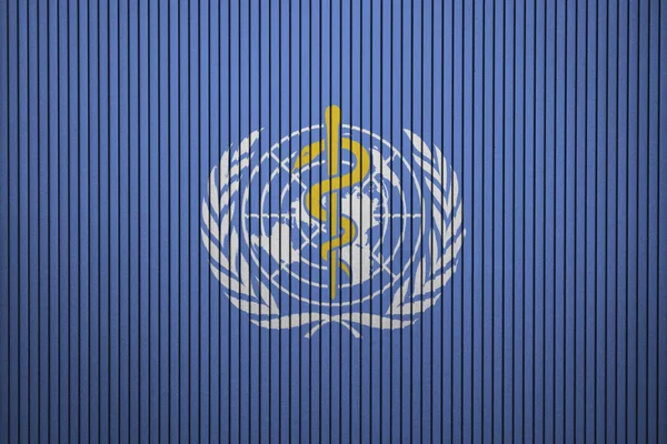 World Health Organization flag painted on the concrete wall