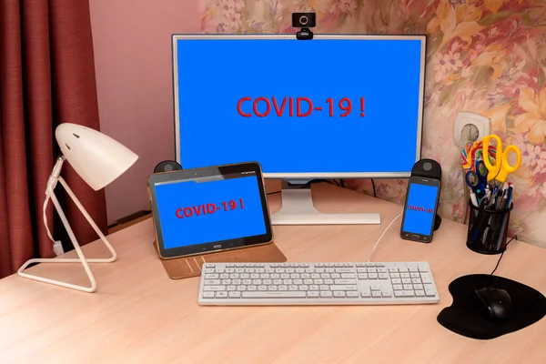 phone tablet and computer monitor warn of COVID-19 infection