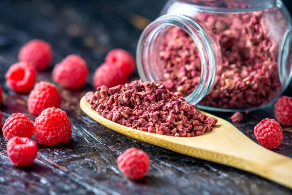 Freeze Dried Raspberries Glass Jar Wooden Spoon Black Background Concept — Stock Photo, Image