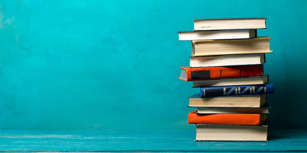 Books on wooden desk table and abstract background. Education background. Copy Space. Back to school. Stock Photo