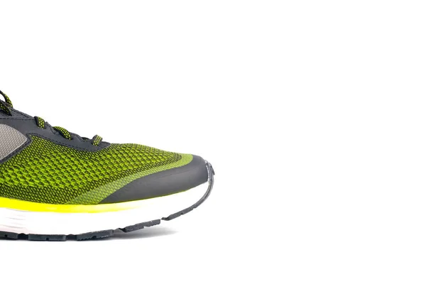 Zole Edilmiş Beyaz Arka Planda Yeşil Floresan Spor Ayakkabısı — Stok fotoğraf