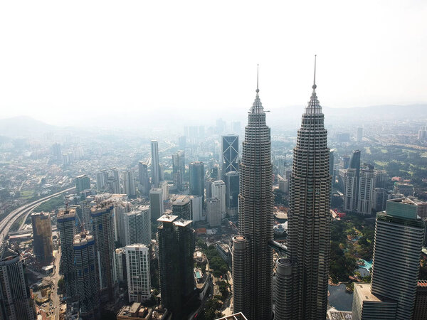 "KualaLumpur,Malaysia- Circa August, 2020: Aerial picture of Kuala Lumpur Twin Tower during sunrise.: