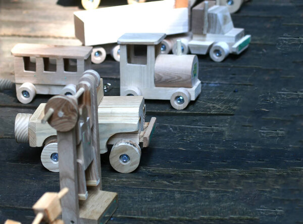 Wooden cars. Car models. Cars handwork from a tree.