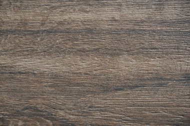 Arka plan olarak koyu bir ahşabın altındaki seramik fayansların güzel dokusu