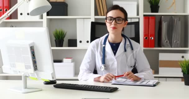 Doctor Showing Information Documents Looking Camera — Stock Video