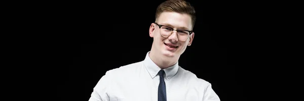 Portrait of confident handsome ambitious smiling elegant responsible businessman with thumb up on black background — Stock Photo, Image