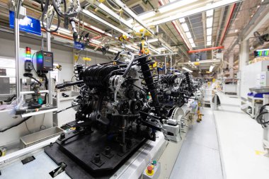 Motorlu Araç Meclisi. Robot araba Meclisi olmasını sağlamaktadır. Modern araç montaj fabrikası'nda