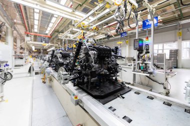 Motorlu Araç Meclisi. Robot araba Meclisi olmasını sağlamaktadır. Modern araç montaj fabrikası'nda