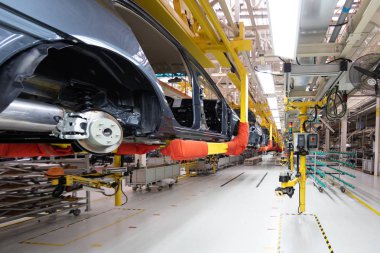 araba vücut alt görünümü transferi. Robot araba Meclisi olmasını sağlamaktadır. Modern araç montaj fabrikası'nda