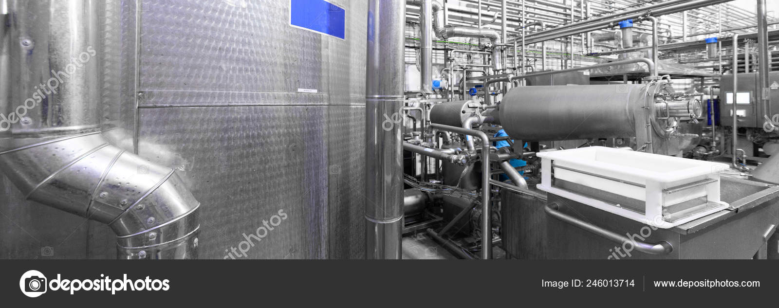 Steel Tanks And A White Container Of Cottage Cheese Industrial