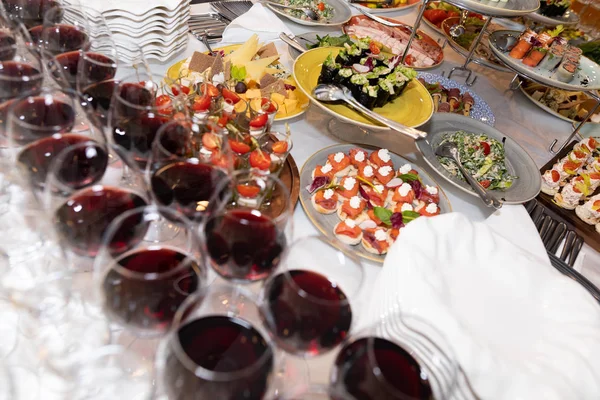 Festive table with bright snacks — Stock Photo, Image