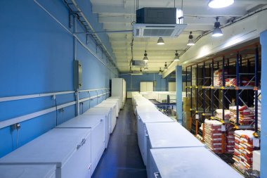 Warehouse with white refrigerators clipart