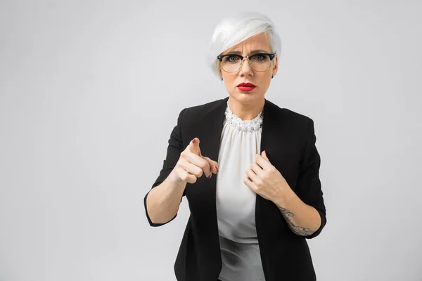 Portrait of young buisness lady in costumes isolated on background — Stock Photo, Image