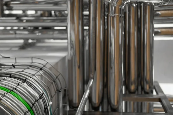 Bright wires and chrome pipes. industrial background — Stock Image Bright wires and chrome pipes. industrial background Royalty Free Stock Images