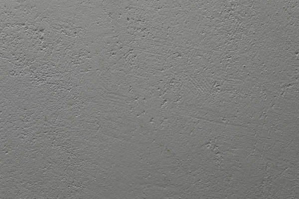 En ojämn målad gråblå betongvägg — Stockfoto