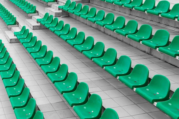Diagonal view of empty green stadium seats ready for sport competition — Stock Photo, Image
