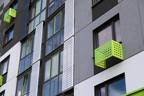 Wall of green, white and grey block of flats — Stock Photo, Image