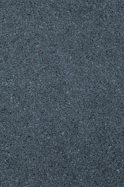 Dark grey painted ground covering outside in the daylight — Stock Photo, Image