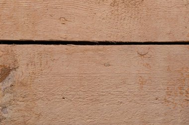 Aralarında bir boşluk ile bej boyalı ahşap plakalar