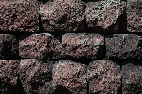 Nahaufnahme Einer Dunkelrot Kastanienbraunen Steinmauer — Stockfoto