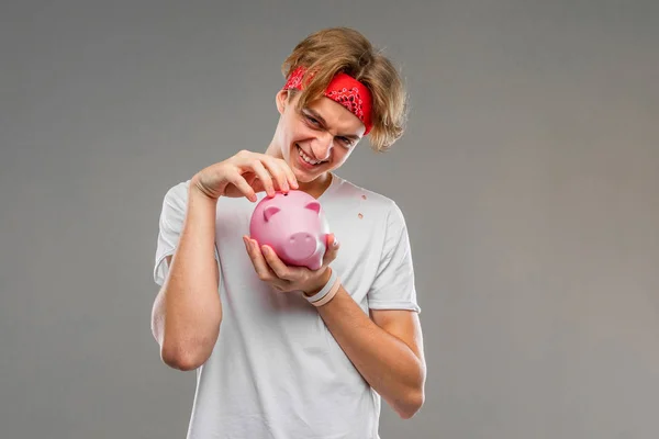 Teenager Piggy Bank Posing Gray — Stock Photo, Image