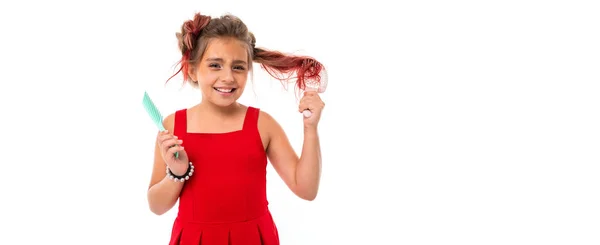 Linda Niña Posando Con Cepillos Pelo Sobre Fondo Blanco —  Fotos de Stock