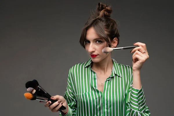 Portrait Young Woman Putting Makeup Green White Striped Blouse Makeup — Stock Photo, Image