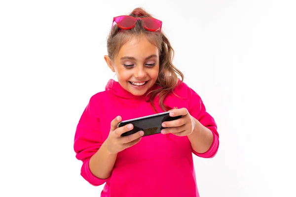 Милая Маленькая Девочка Позирует Мобильный Телефон Белом Фоне — стоковое фото
