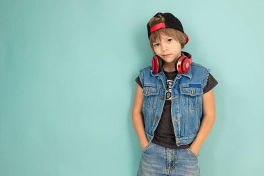 handsome little boy posing in studio