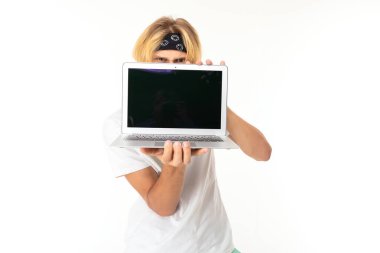 man posing with laptop against white background  