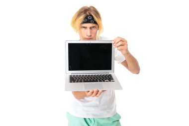 man posing with laptop against white background  