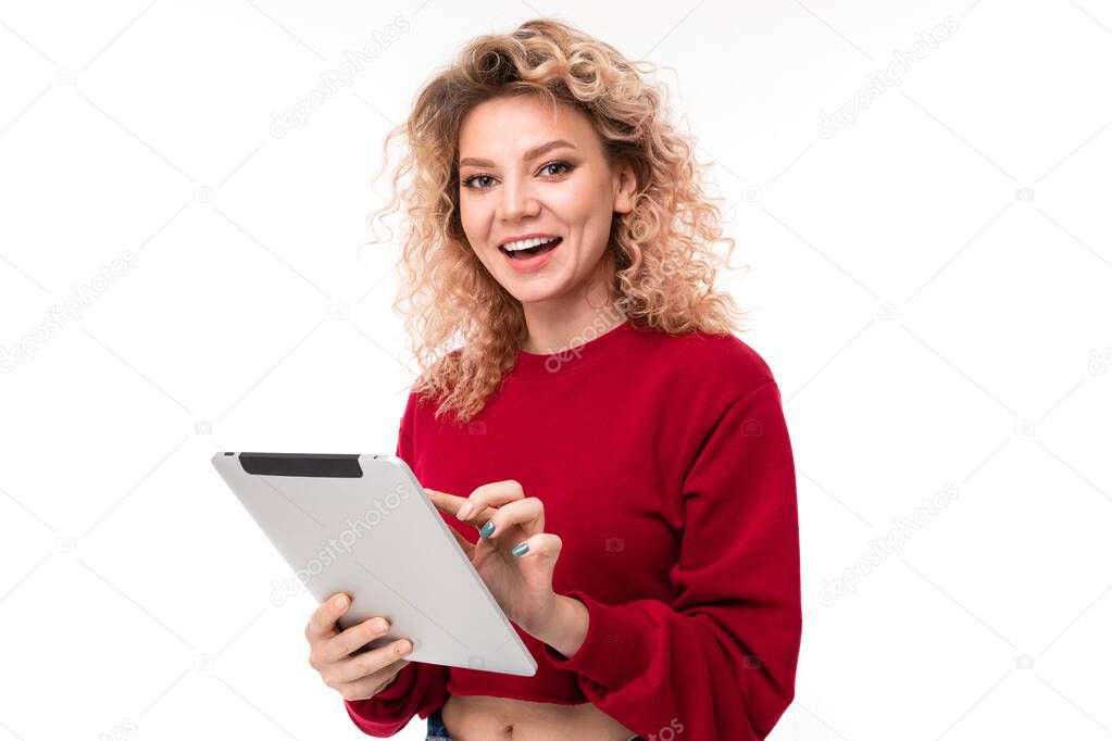 young woman posing with digital tablet against white background  