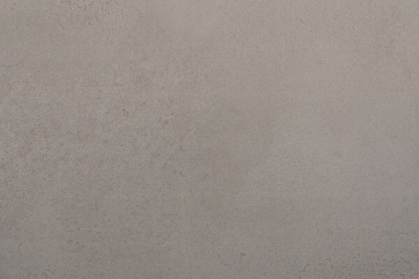 Гладкая, светло-серая поверхность стены добавляет тонкое прикосновение к любому пространству. Его чистый дизайн идеально подходит для различных стилей интерьера и повышает современную эстетику.