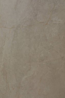 Sahne bej renkli düz bir yüzey sergiliyor. Renk ve dokuda yumuşak varyasyonlar var. Bu doğal materyal herhangi bir dekor seçimine zarafet ve basitlik ekler.