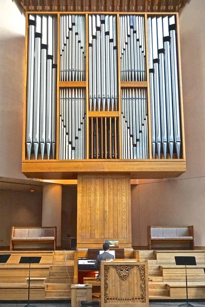 New York, New York, USA: An organist rehearses at Saint Peters Church in midtown Manhattan.