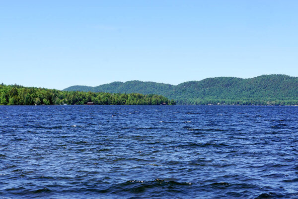 Inlet, New York: The choppy waters of Fourth Lake, located near the town of Inlet, New York. Fourth Lake is part of the Fulton Chain Lakes in the Adirondack Park.