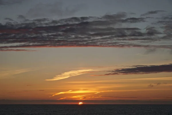 Sunset on the Gulf of Alaska, viewed from a cruise ship sailing west from Hoonah to Anchorage.