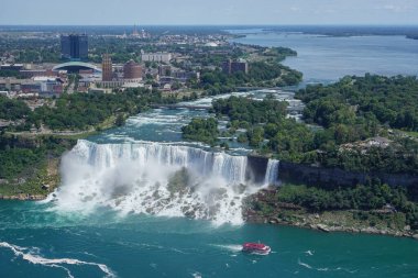 Niagara Falls, New York, USA: Aerial view of the American and Bridal Veil Falls, Goat Island, the Niagara River, and the city of Niagara Falls. clipart