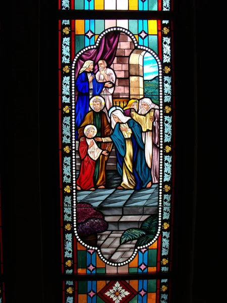 Bangkok, Tayland, 23 Eylül 2015: Varsayımın Katedrali 'nde İncil' in resmi olan lekeli cam pencere. Bangkok