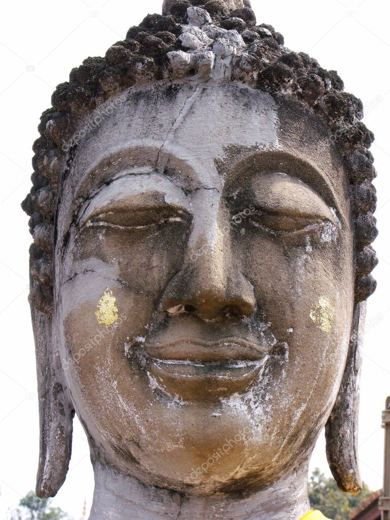 Ayutthaya, Thailand, January 24, 2013: Stone bust of Buddha in Ayutthaya, former capital of the kingdom of Siam. Thailand